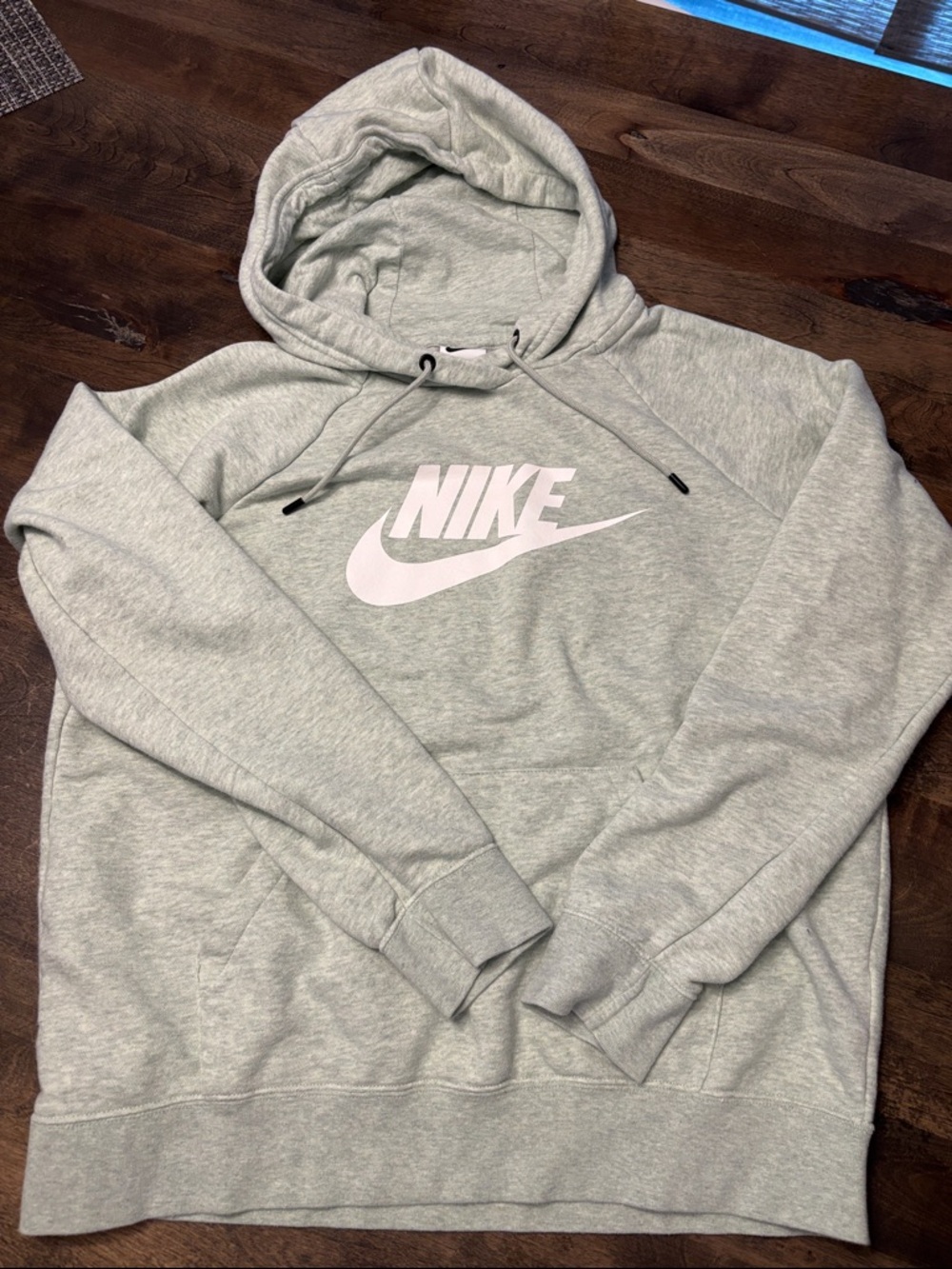 Women’s Nike Light Green Pullover Hoodie with White Swoosh